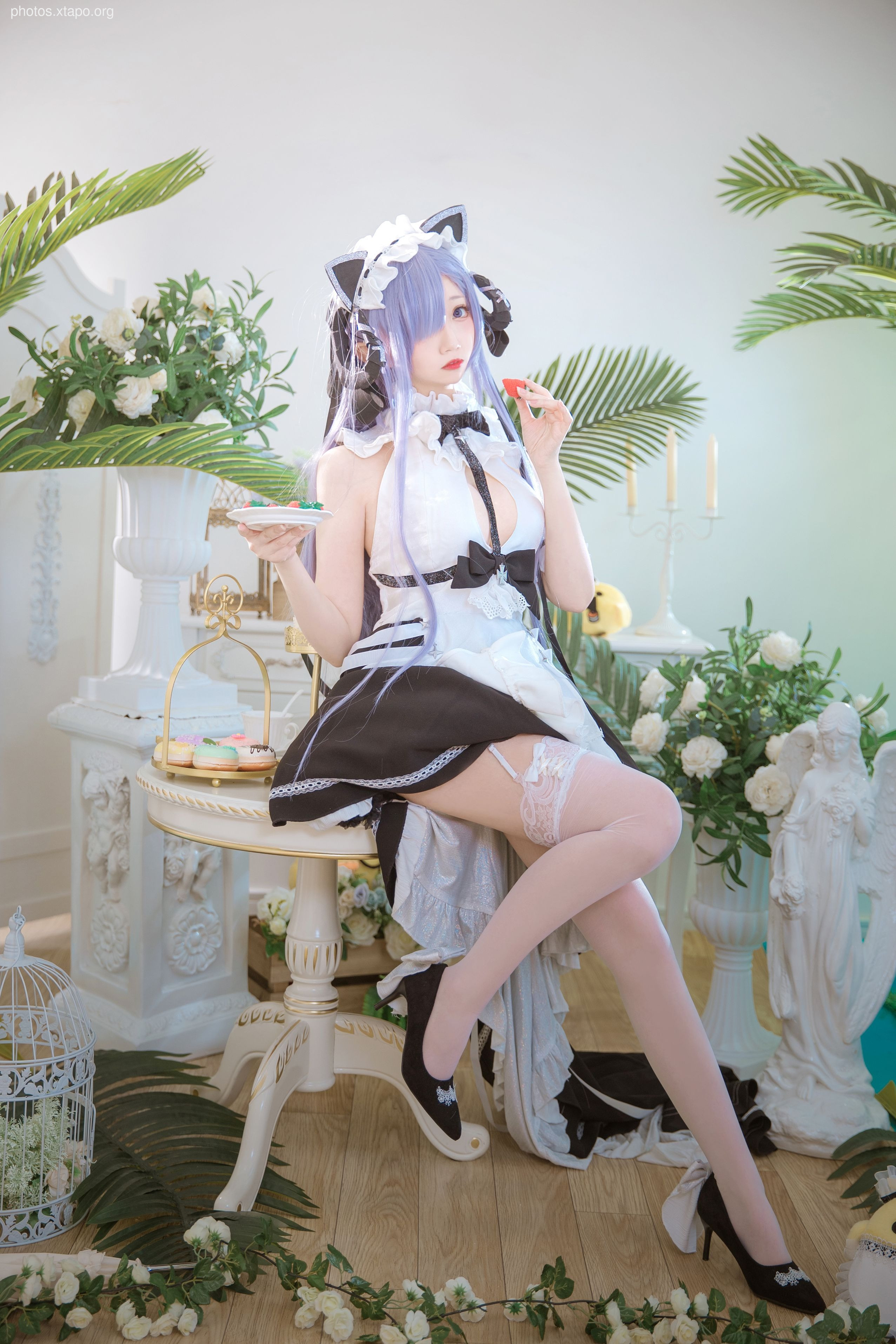 A captivating cosplay photograph of a young woman dressed as a maid, showcasing intricate details of the costume and the elegance of the setting.
