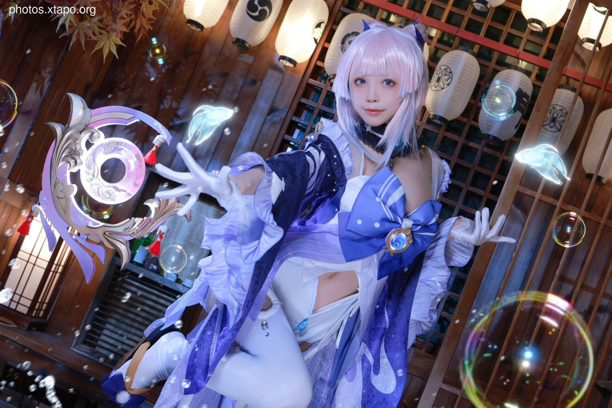 A captivating cosplay portrayal of a Miko, immersed in a fantasy world filled with magical bubbles and enchanting artifacts. The intricate details of the costume and the ethereal setting create a truly immersive experience.