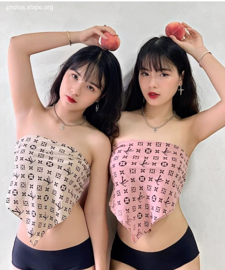 Matching outfits and sweet treats. These twins are serving serious style goals.